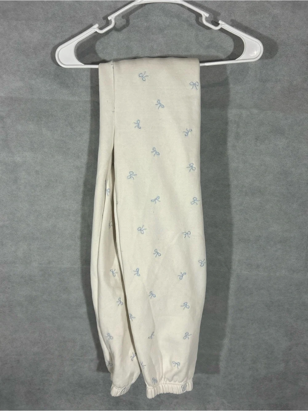 Kids Cream Crewneck Sweater with Light Blue Bow Print